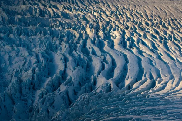 Aerial shot of crevasses in a glacier in the southern alps of New Zealand