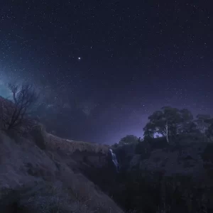 Lal Lal Falls waterfall at night with frost and the Milky Way rising above